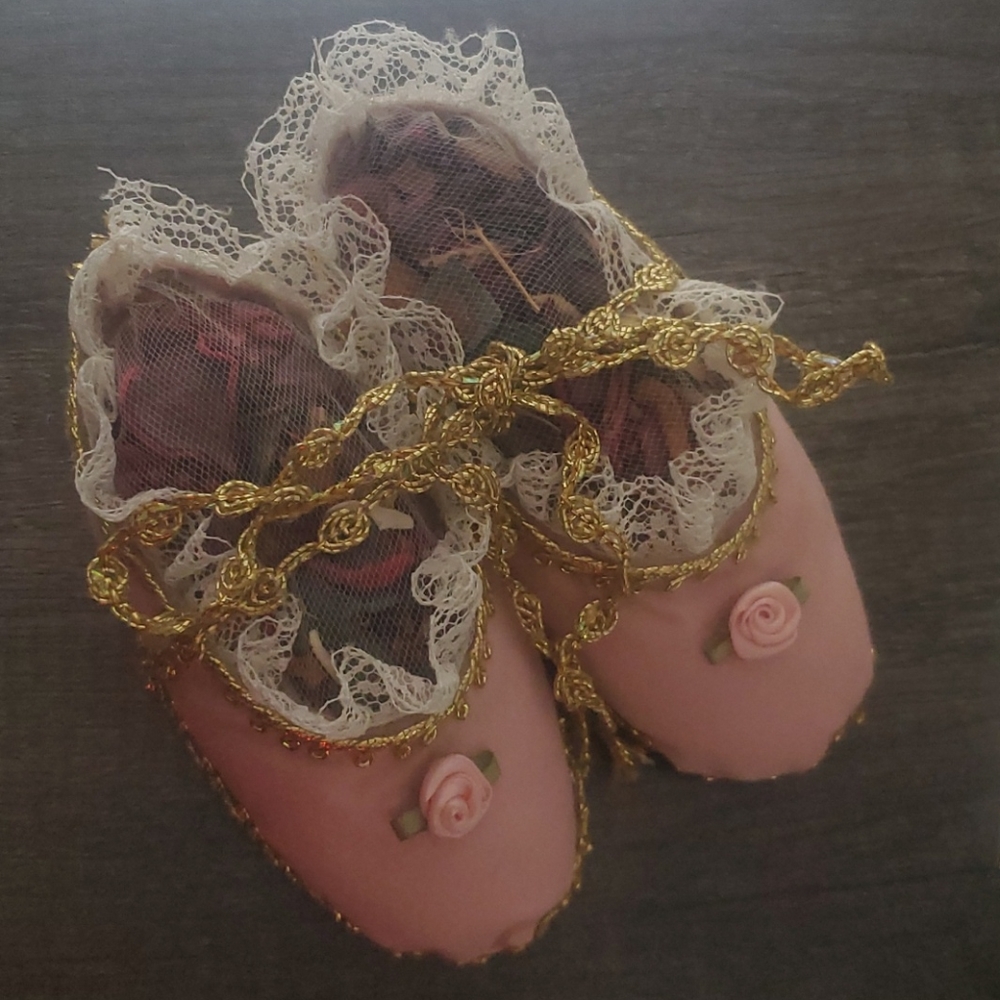 Vintage handmade potpourri baby shoes